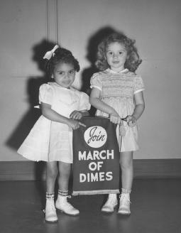 Rose Marie Waters and Linda Brown, March of Dimes poster children; 1949